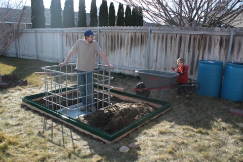 Me taking a short breather, standing within the tote cage now in place, photo by Hannah