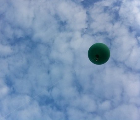 Airship heading towards the clouds